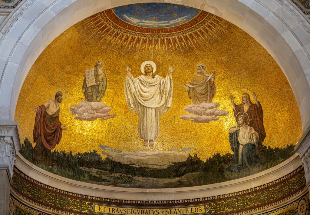 Stunning mosaic depiction of the Transfiguration of Jesus in a church dome, showcasing biblical figures in vibrant detail.