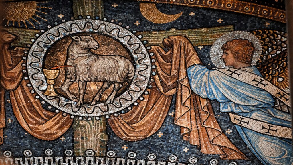 Intricate mosaic art featuring a lamb, chalice, and angel in a religious setting.